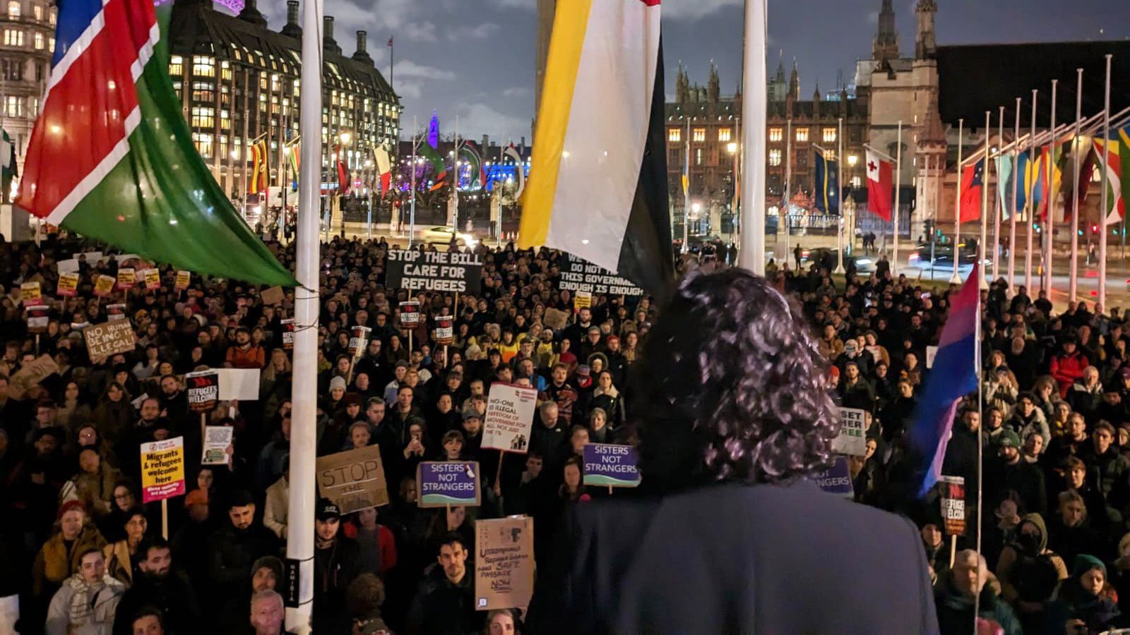 Nadia addressing a demonstration outside Parliament against the Illegal Migration Bill